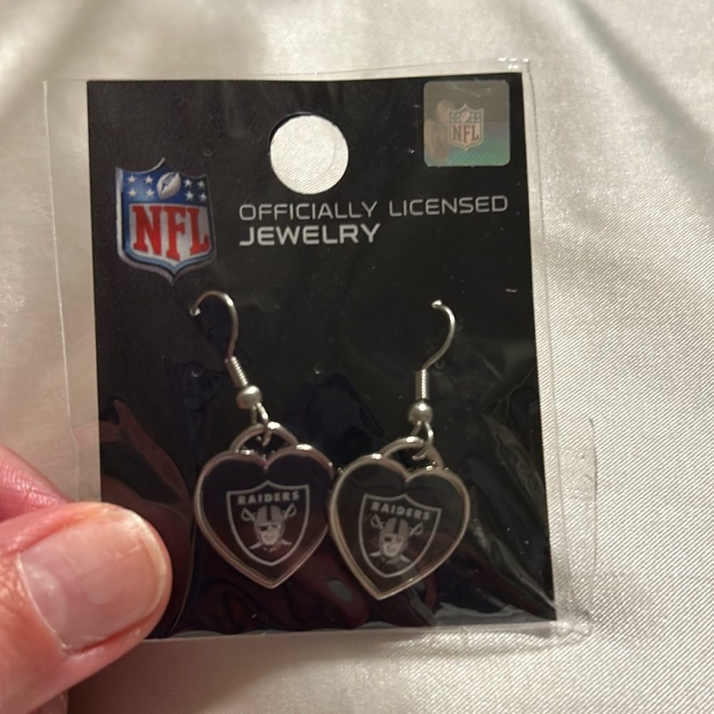 Raiders Heart Shaped dangle earrings. Brand New Never Worn.